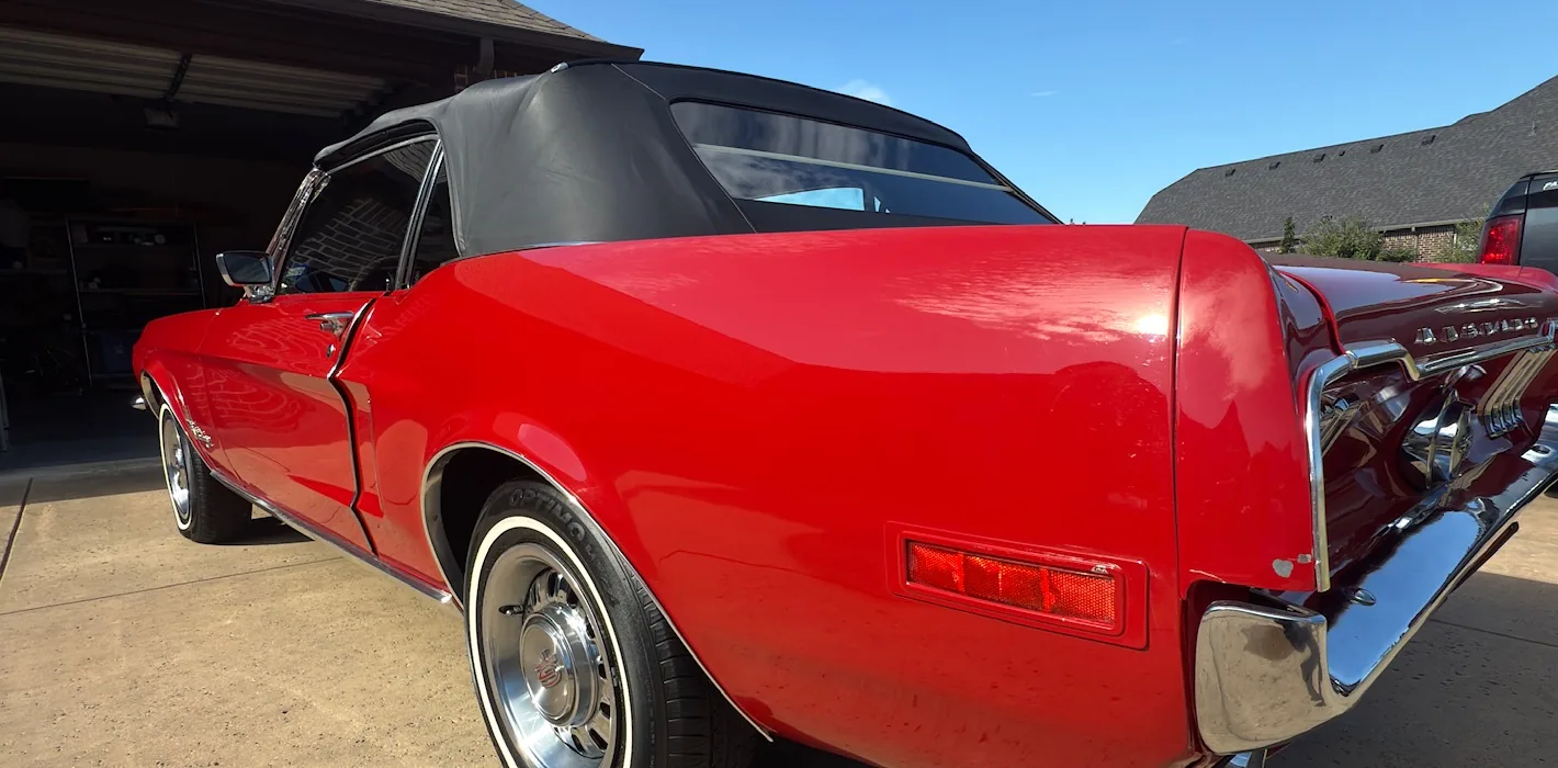 Red classic convertible after exterior detailing in Hood County