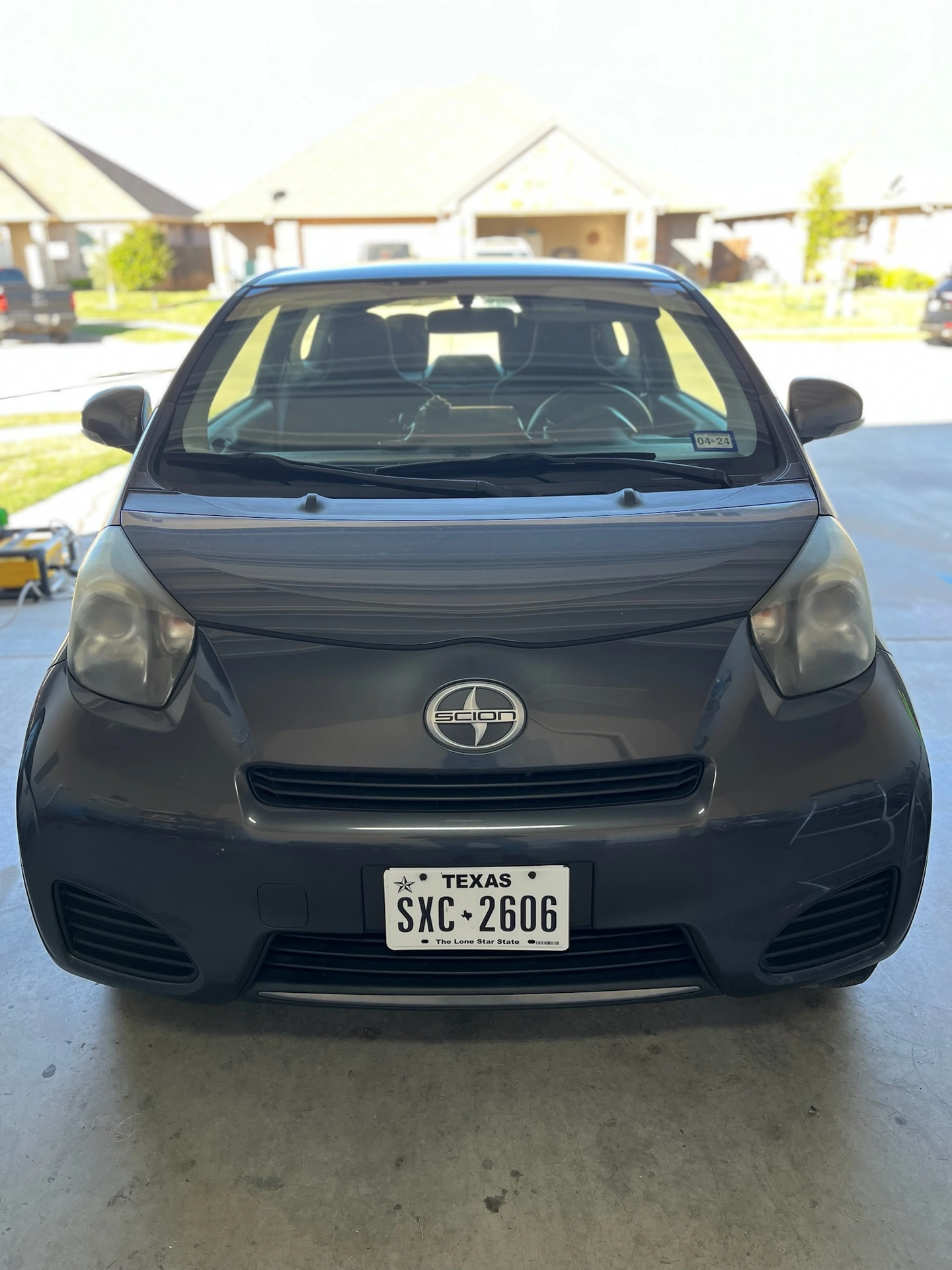 Cloudy Scion iQ headlight before restoration