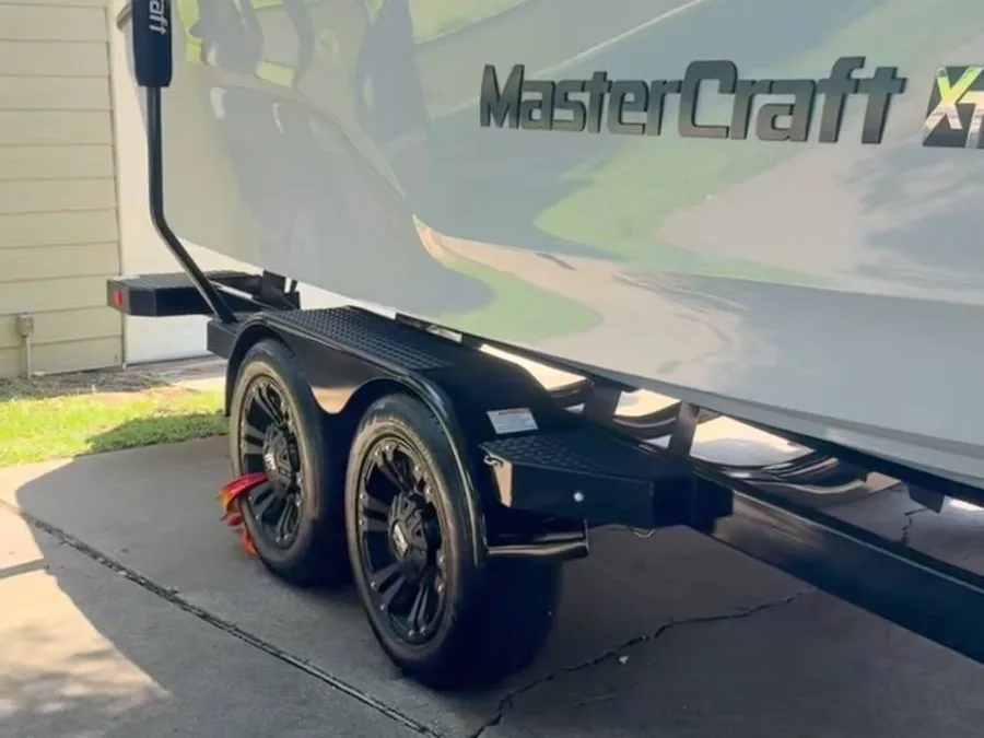 MasterCraft boat being detailed on its trailer