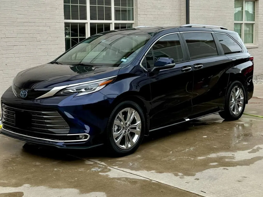 Dark blue Toyota Sienna minivan after a mobile hand wash