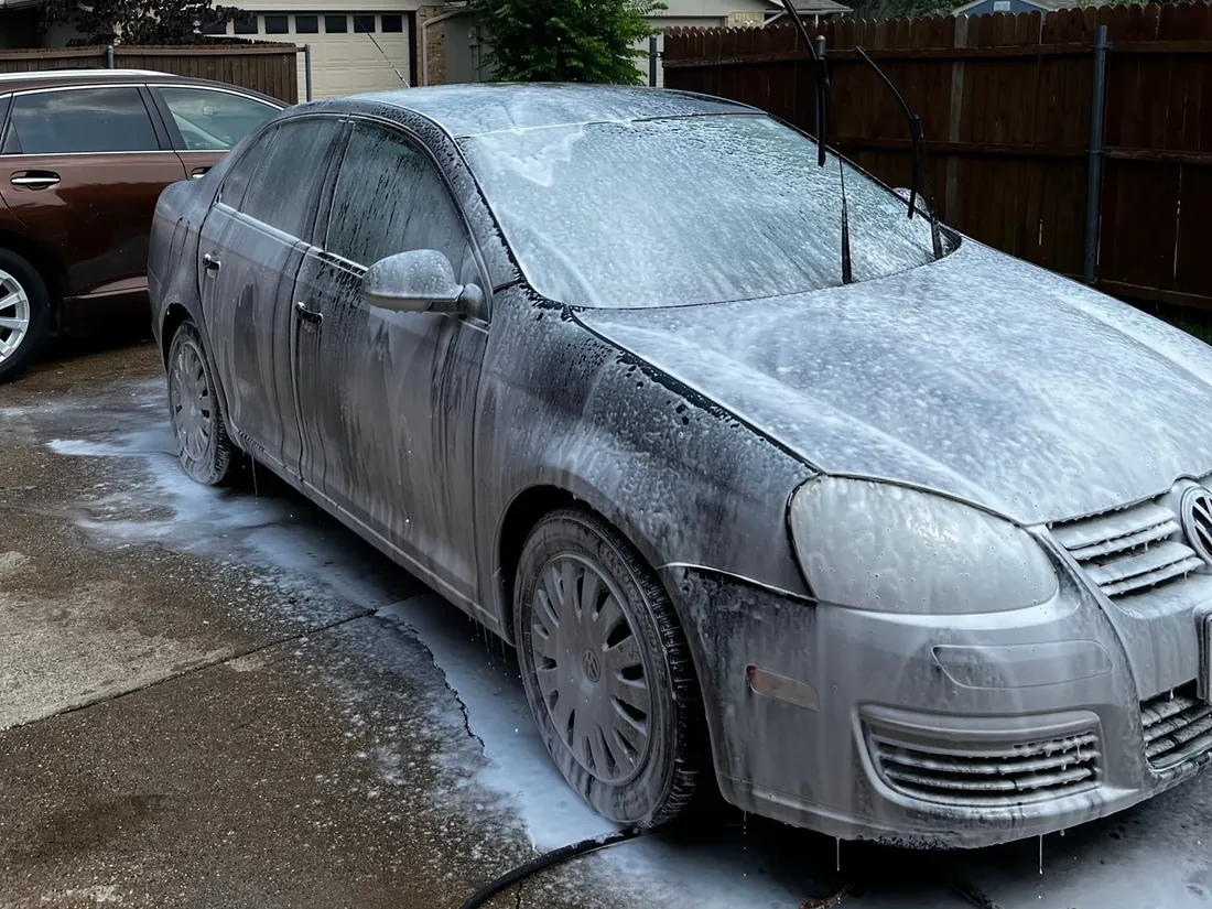 Volkswagen Jetta covered in foam during a mobile hand wash