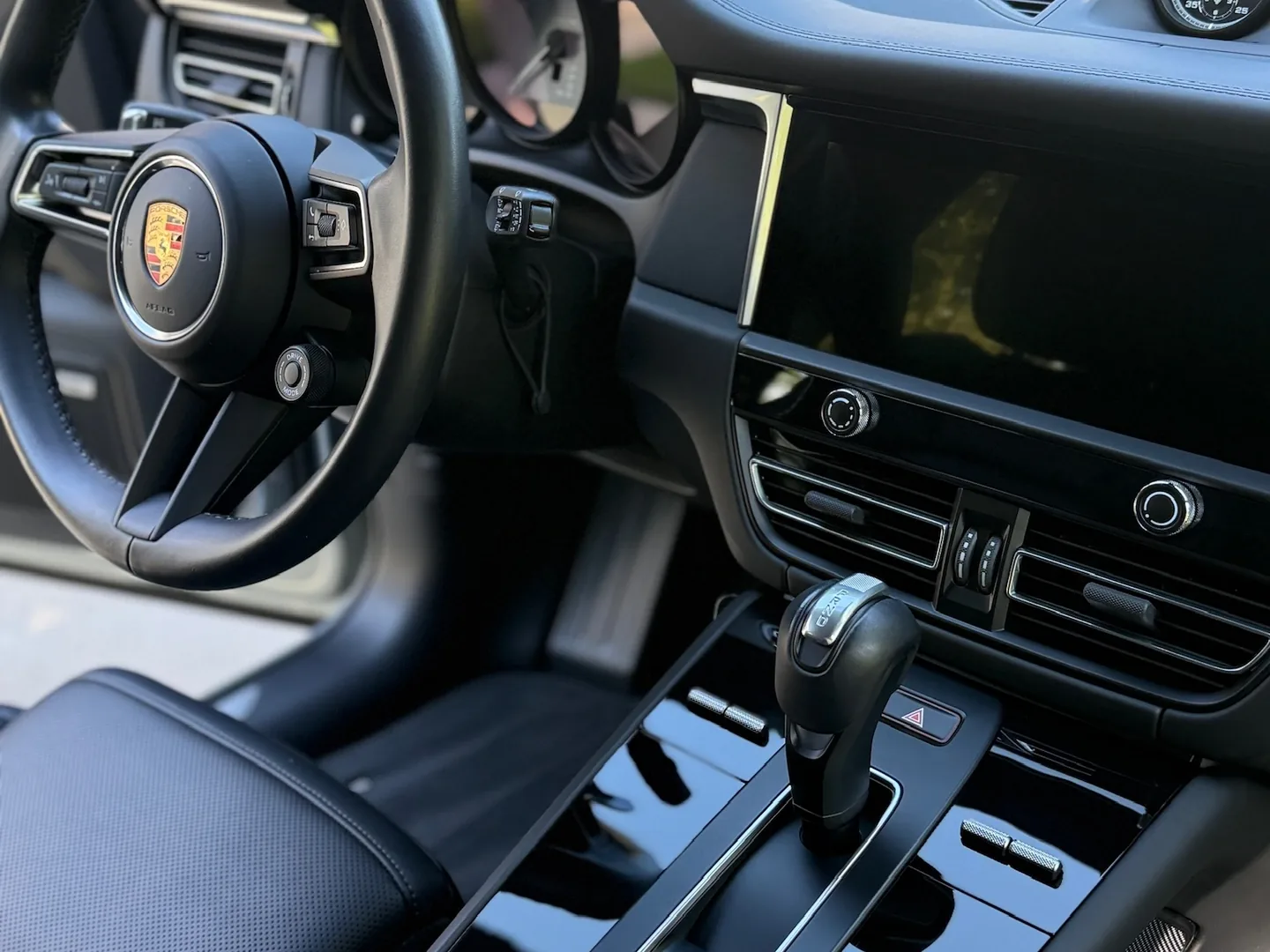 Spotless detailed vehicle interior with conditioned leather and clean glass