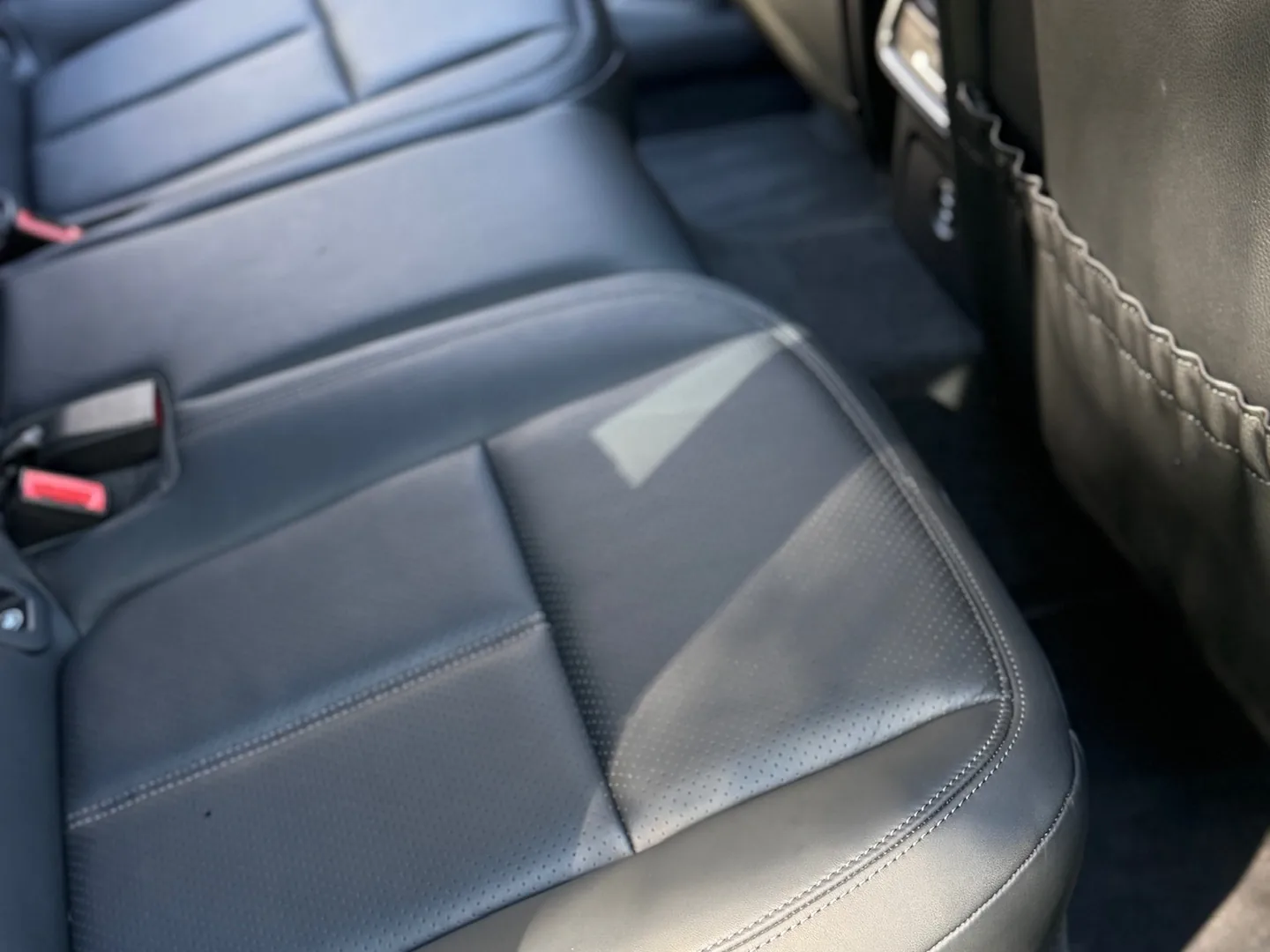 Clean Porsche Macan rear seat after interior detailing