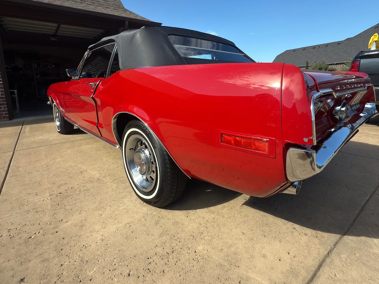 Red classic convertible after exterior detailing